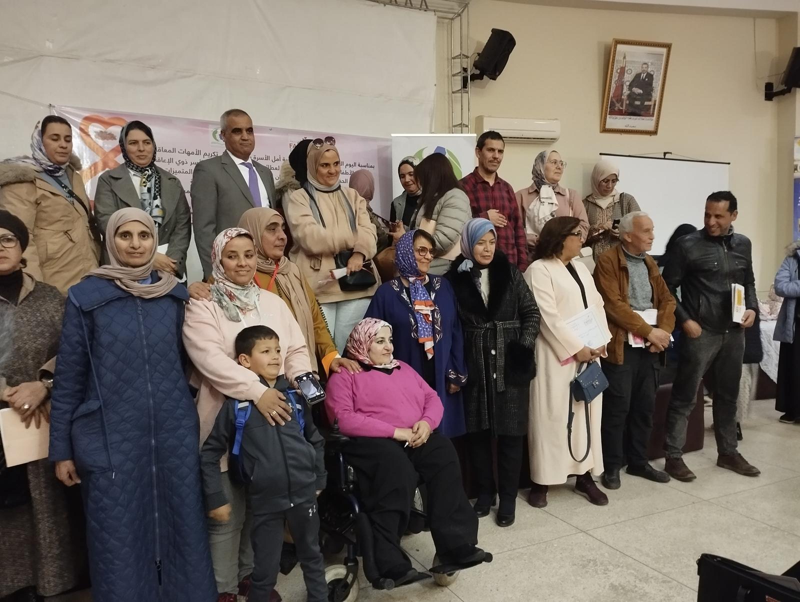 جمعية الأمل للأسرة تحتفل باليوم العالمي للمرأة وتكرم الأمهات المعاقات وأمهات الأطفال المعاقين 4 IMG 20250223 WA0021 1